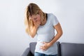 Pregnant Woman Suffering From Nausea Royalty Free Stock Photo