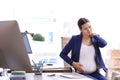Young pregnant woman suffering from pain while working Royalty Free Stock Photo