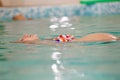 Young pregnant woman in swimming pool Royalty Free Stock Photo