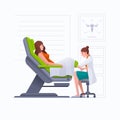 Young pregnant woman or woman is lying in gynecological examination chair during gynecological exam Royalty Free Stock Photo