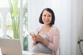 Young pregnant woman working in home office Royalty Free Stock Photo