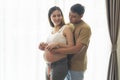 Young pregnant woman measuring belly centimeter, healthcare and pregnancy care Royalty Free Stock Photo