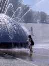 Preteen Girl at Play in Seattle Fountain