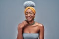 Young pretty african-american girl posing cheerful emotional on grey background isolated