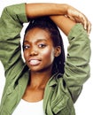 Young pretty african-american girl posing cheerful emotional on white background isolated, lifestyle people concept