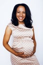 Young pretty african american woman pregnant happy smiling, posing on white background isolated , lifestyle people