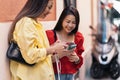 Young Asian Women Using Cellphone Royalty Free Stock Photo