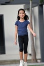 Young Filipina Tween Walking