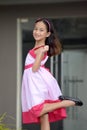 Youthful Girl Dancing Wearing Dress