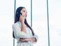 Young pretty Asian woman talking on the phone call. Portrait of Beautiful business woman using mobile phone in conversation Royalty Free Stock Photo