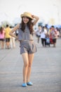 Young and pretty asian woman wearing straw hat standing and post Royalty Free Stock Photo