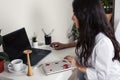 young pretty asian woman in white form working in clinic with laptop, lifestyle working people concept Royalty Free Stock Photo