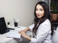 young pretty asian woman in white form working in clinic with laptop, lifestyle working people concept Royalty Free Stock Photo