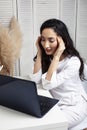 young pretty asian woman in white form working in clinic with laptop, lifestyle working people concept Royalty Free Stock Photo