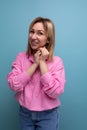young pretty blond careerist leader woman with shoulder-length hair in a pink blouse Royalty Free Stock Photo