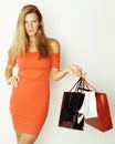 Young pretty blond woman with bags on Christmas Royalty Free Stock Photo