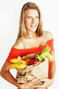 young pretty blond woman at shopping with food in paper bag isol Royalty Free Stock Photo