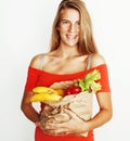 young pretty blond woman at shopping with food in paper bag isol Royalty Free Stock Photo