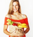 Young pretty blond woman at shopping with food in paper bag isol Royalty Free Stock Photo