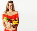 young pretty blond woman at shopping with food in paper bag isol Royalty Free Stock Photo