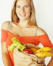 Young pretty blond woman at shopping with food in Royalty Free Stock Photo