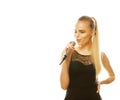 Young pretty blond woman singing in microphone isolated close up karaoke Royalty Free Stock Photo