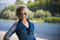 Young Pretty Blond Woman in Trendy Denim Fashion Outdoor Royalty Free Stock Photo