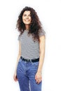 Young pretty brunette girl with curly hair happy smiling on white background , lifestyle people concept Royalty Free Stock Photo