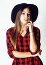 Young pretty brunette girl hipster in hat on white background ca Royalty Free Stock Photo