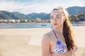 Young pretty brunette in a swimsuit Royalty Free Stock Photo