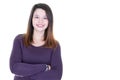 Young pretty brunette woman on white background smiles and laughs to the camera aside copy space