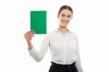 Young pretty business woman holding green cardboard and smiling