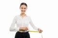 Young pretty business woman using yellow measuring tape Royalty Free Stock Photo