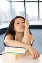 Young pretty chinese asian student woman working paperwork and books tired and bored Royalty Free Stock Photo