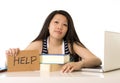 Young pretty chinese girl with help sign working