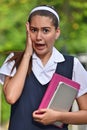 Catholic Female Student And Confusion Wearing School Uniform With Books