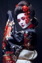 Young pretty geisha in kimono Royalty Free Stock Photo