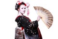 Young pretty geisha in kimono with sakura and decoration Royalty Free Stock Photo