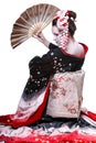 Young pretty geisha in kimono with sakura and decoration Royalty Free Stock Photo