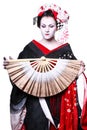 Young pretty geisha in kimono with sakura and decoration Royalty Free Stock Photo