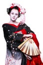 Young pretty geisha in kimono with sakura and decoration Royalty Free Stock Photo