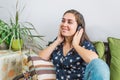 Young pretty girl with her cell phone, listening music Royalty Free Stock Photo