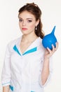 Young pretty girl nurse with blue squirt in hands