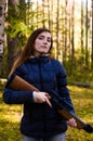 Young pretty girl with rifle Royalty Free Stock Photo