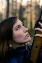 Young pretty girl with rifle Royalty Free Stock Photo