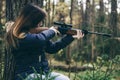 Young pretty girl with rifle Royalty Free Stock Photo
