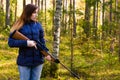 Young pretty girl with rifle