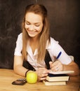 Young pretty girl student in classroom at Royalty Free Stock Photo