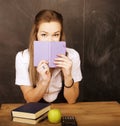 Young pretty girl student in classroom at Royalty Free Stock Photo