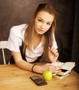 Young pretty girl student in classroom at blackboard Royalty Free Stock Photo